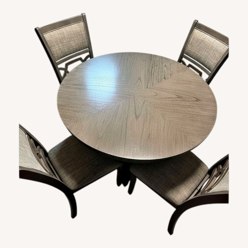 Used Ashley Furniture Dark Gray Wood Dining Set for sale on AptDeco
