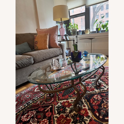 Used Glass Coffee Table with Bronze/Gold Base for sale on AptDeco