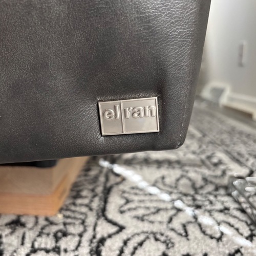 Used Elran Black Power Reclining Sofa for sale on AptDeco