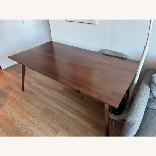 Used Article Dark Brown Wood Dining Table for sale on AptDeco