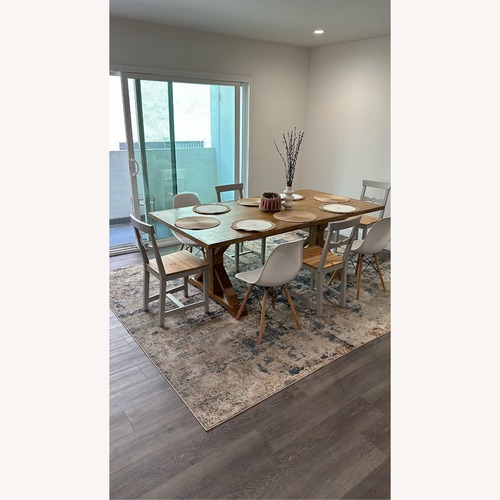 Used Solid Wood Farmhouse Dining Table + 8 Chairs for sale on AptDeco