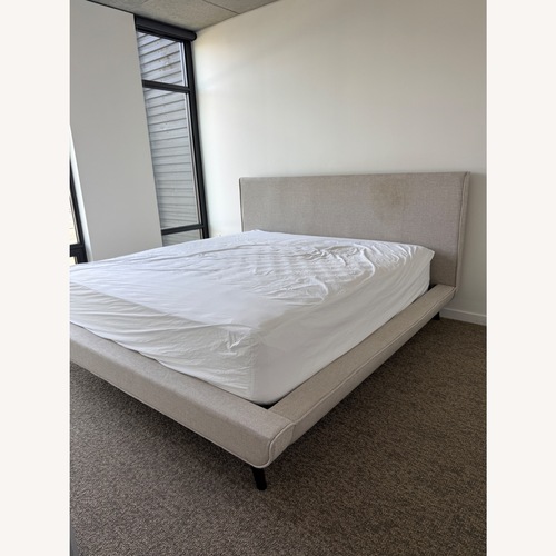 Used Saatva Porto King Bed Frame for sale on AptDeco