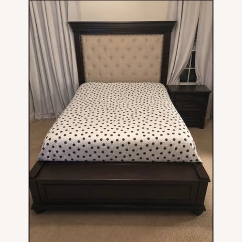Used Ashley Furniture Dark Brown Wood Queen Bed for sale on AptDeco