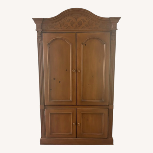 Used Light Brown Wood Armoire for sale on AptDeco