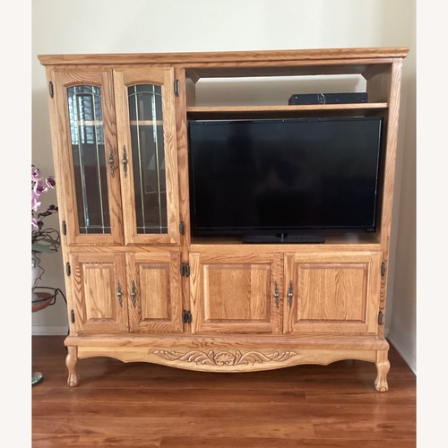 Used Solid Oak Entertainment Center with 37” Vizio TV for sale on AptDeco