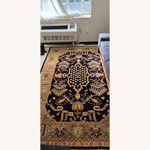 Used Pottery Barn Black/Tan Wool Area Rug 6' x 9' for sale on AptDeco