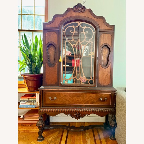 Used Vintage/Antique Finds Dark Brown Wood Armoire for sale on AptDeco