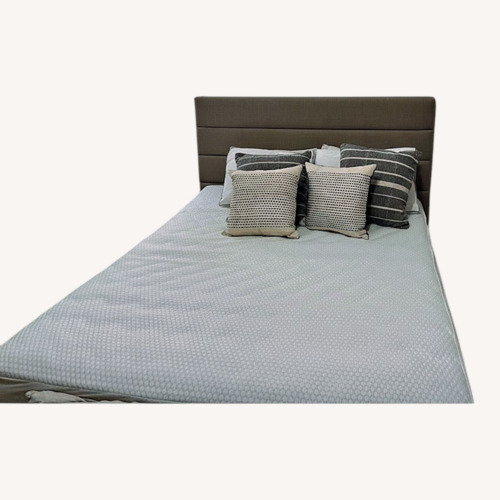 Used Flou Queen Storage Bed With White Fabric Over Frame for sale on AptDeco