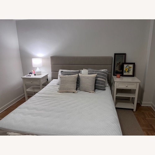 Used Flou Queen Storage Bed With White Fabric Over Frame for sale on AptDeco