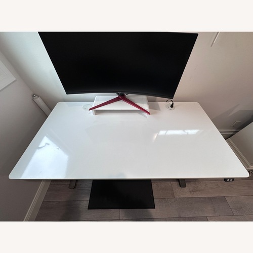 Used UPLIFT Electric Standing Desk Whiteboard Top for sale on AptDeco