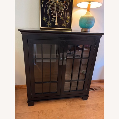 Used Crate & Barrel Windham Black Curio Glass Case Cabinet for sale on AptDeco