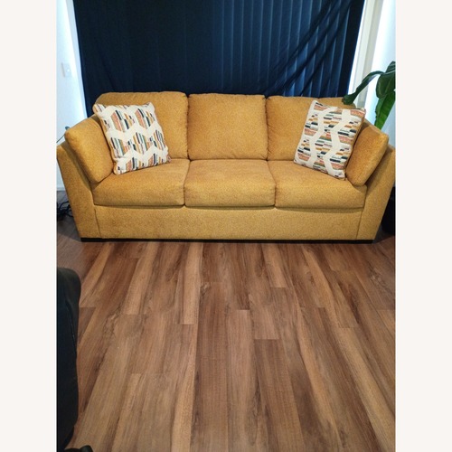 Used Ashley Yellow Fabric 3+ Seater Sofa for sale on AptDeco
