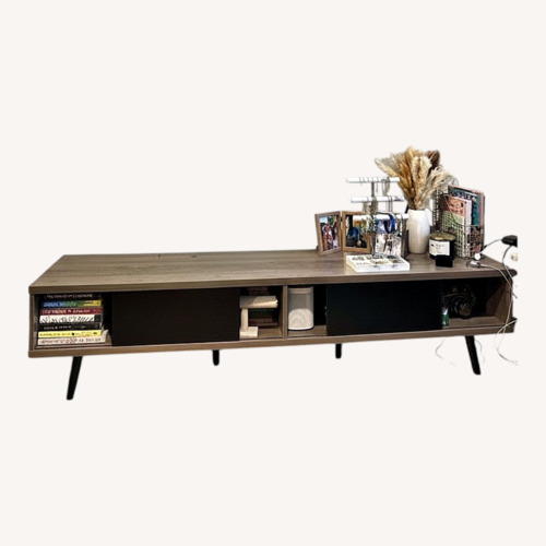 Used Light Wood Tv Stand with Moving Doors  for sale on AptDeco
