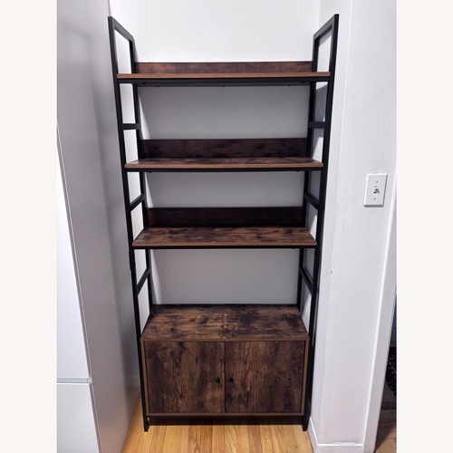 Used Industrial Ladder Bookshelf with Cabinet Storage for sale on AptDeco