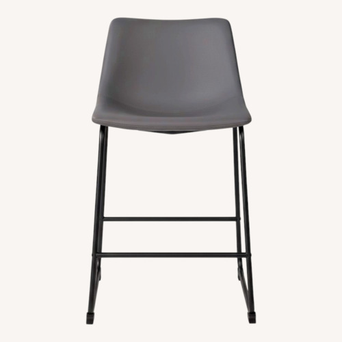 Used Ashley Furniture Centiar Dark Gray Stools for sale on AptDeco