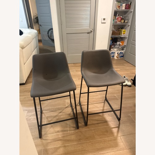 Used Ashley Furniture Centiar Dark Gray Stools for sale on AptDeco