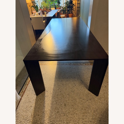 Used Restoration Hardware Dark Brown Wood Dining Table for sale on AptDeco
