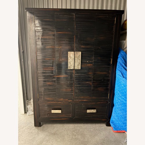 Used Asian Modern Crushed Bamboo Armoire Cabinet for sale on AptDeco
