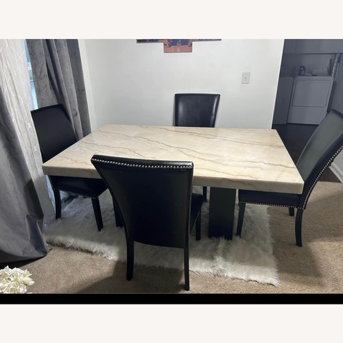 Used Value City Furniture Light Brown Dining Table for sale on AptDeco