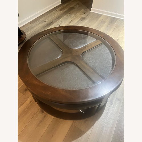 Used Dark Brown Wood Coffee Table for sale on AptDeco