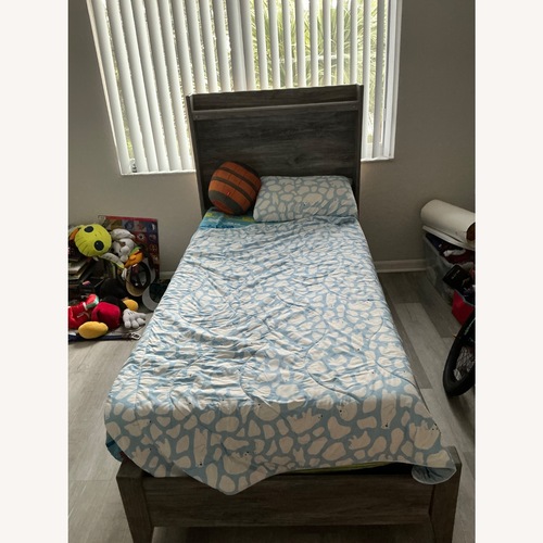 Used Ashley Furniture Baystorm Light Gray Wood Twin Bed for sale on AptDeco
