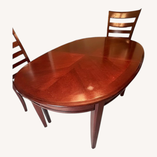 Used Dark Cherry Wood Dining Set w/Chairs for sale on AptDeco