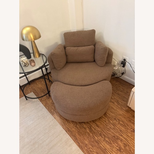 Used beautiful accent chair with foot ottoman for sale on AptDeco