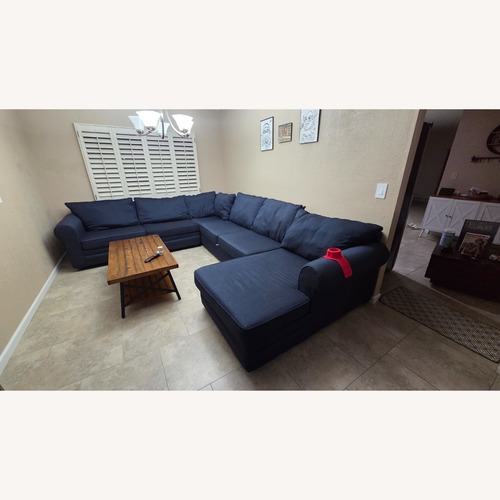 Used Navy Blue 4 Piece Right Arm Facing Sectional for sale on AptDeco