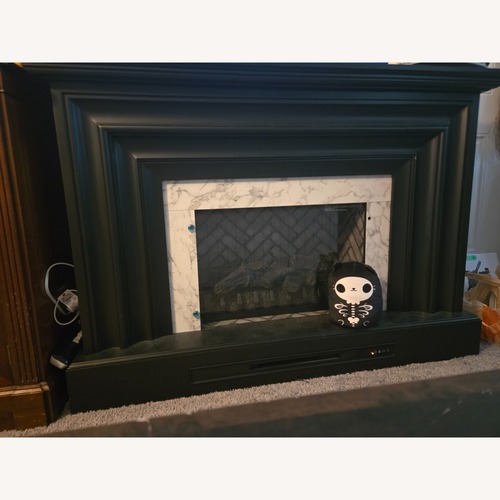 Used Black Wood Décor Electric Fireplace for sale on AptDeco