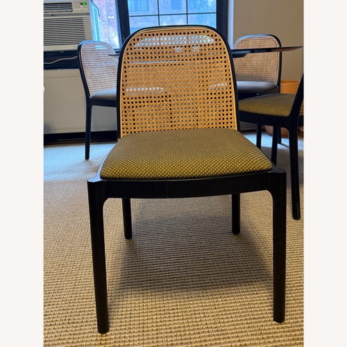 Used CB2 Nadia Black Cane Dining Chairs for sale on AptDeco