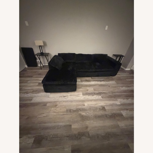 Used Black Fabric 2 Piece Sectionals for sale on AptDeco