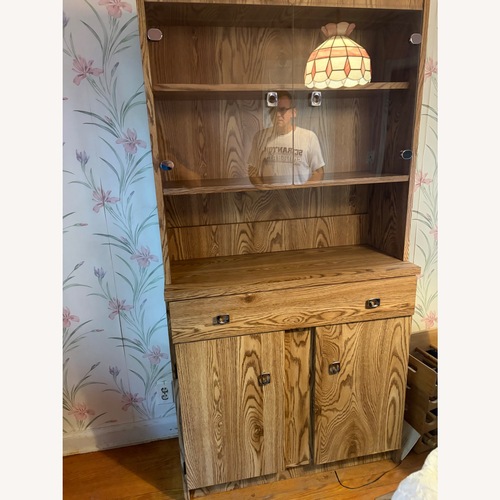 Used Vintage Oak Wood Hutch with Glass Doors for sale on AptDeco