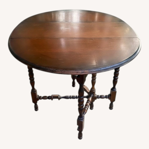 Used Light Brown Wood Dining Table for sale on AptDeco