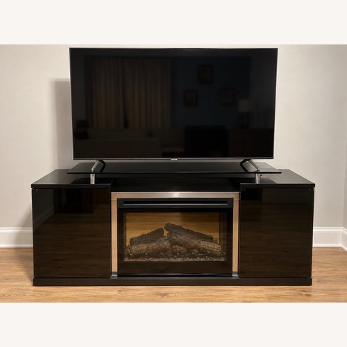 Used Entertainment Center With Heated Fire Place for sale on AptDeco