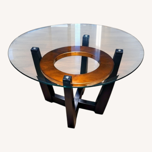 Used Raymour & Flanigan Glass Coffee Table for sale on AptDeco