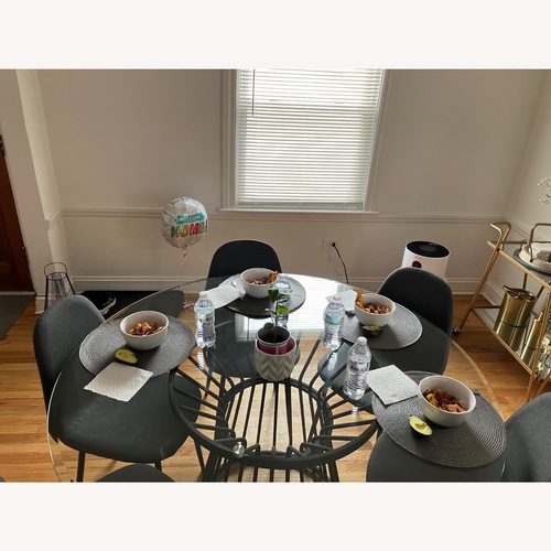 Used Pre Owned Glass Dining Table Set for sale on AptDeco