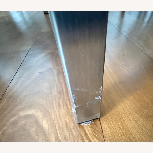 Used Room & Board End Table Glass/Stainless Steel  for sale on AptDeco