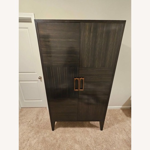 Used Arteriors Home Dark Brown Wood Armoire for sale on AptDeco