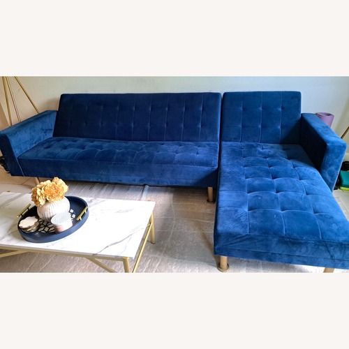 Used Wade Logan 117" Blue Velvet Sleeper Sectional for sale on AptDeco