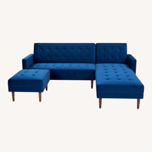 Used Wade Logan 117" Blue Velvet Sleeper Sectional for sale on AptDeco