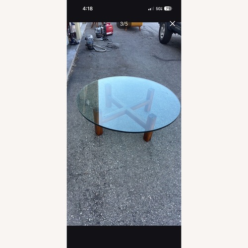 Used Vintage Wormwood Glass Topped Coffee Table for sale on AptDeco