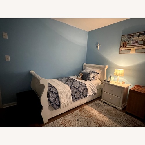 Used White Wood Twin Bed with Trundle for sale on AptDeco