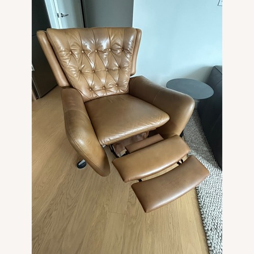 Used Pottery Barn Wells Tufted Leather Swivel Recliner for sale on AptDeco