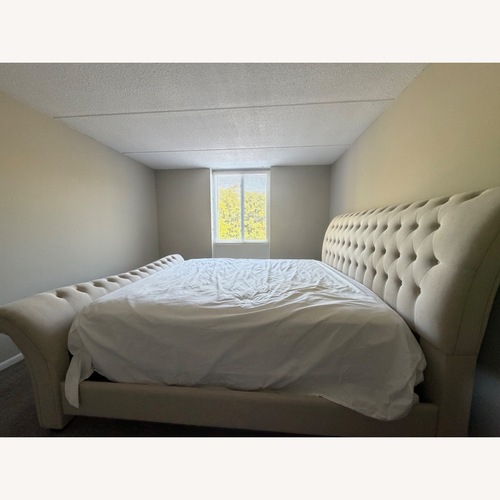 Used Raymour & Flanigan Light Gray King Bed for sale on AptDeco