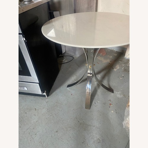 Used Electrum Marble Top With Shiny Metal Legs Table for sale on AptDeco