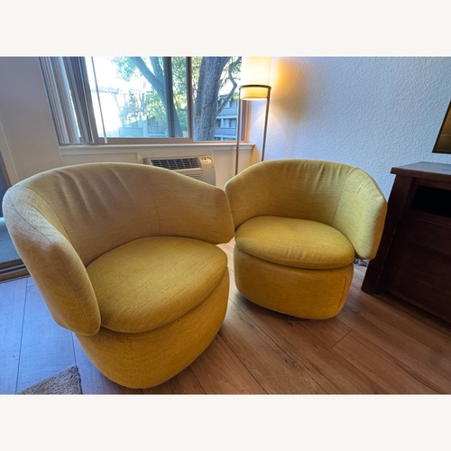 Used West Elm Yellow Crescent Swivel Chair for sale on AptDeco