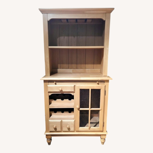 Used Light Brown Wood Armoire for sale on AptDeco