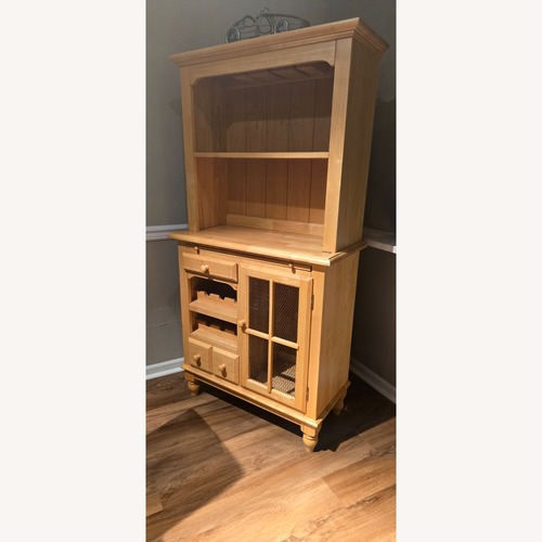 Used Light Brown Wood Armoire for sale on AptDeco