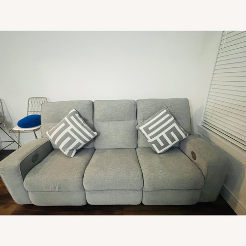 Used Ashley Dual Power Reclining Sofa for sale on AptDeco