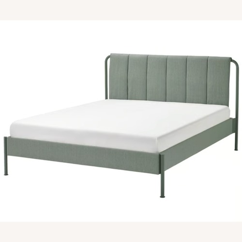 Used IKEA TÄLLÅSEN Green Fabric Queen Bed for sale on AptDeco